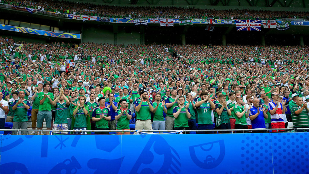 A minutes applause takes place in honour of Northern Ireland fan Darren Rogers who died after falling from a promenade in Nice during the UEFA Euro 2016, Group C match at the Parc Olympique Lyonnais, Lyon. PRESS ASSOCIATION Photo. Picture date: Thursday June 16, 2016. See PA story SOCCER N Ireland. Photo credit should read: Jonathan Brady/PA Wire. RESTRICTIONS: Use subject to restrictions. Editorial use only. Book and magazine sales permitted providing not solely devoted to any one team/player/match. No commercial use. Call +44 (0)1158 447447 for further information.